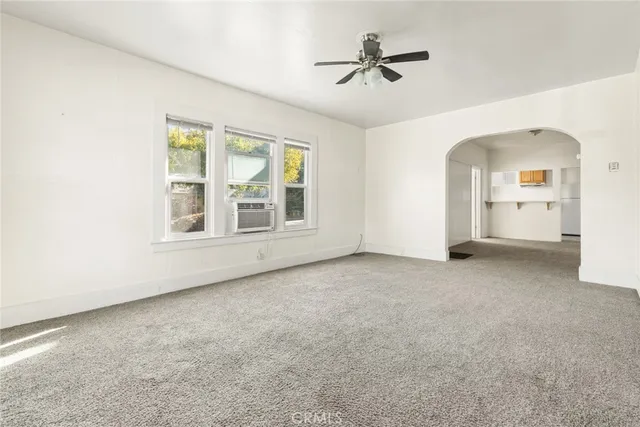 a view of empty room with windows