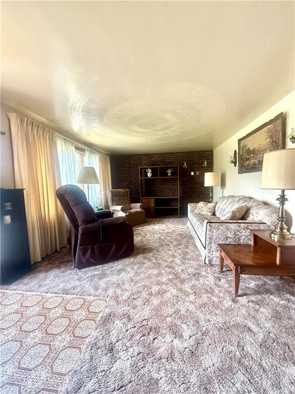 151 Huntingdon Road Wyano, PA 15695 - Photo 22 of 36 a living room with furniture a rug and a window
