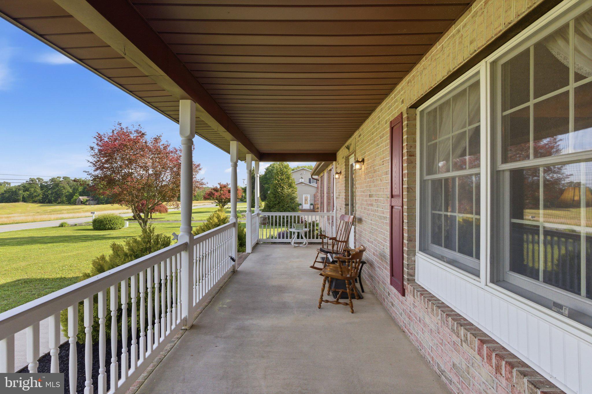 18310 Upper Beckleysville Road Hampstead, MD 21074 - Photo 10 of 67 Charming porch with scenic views.