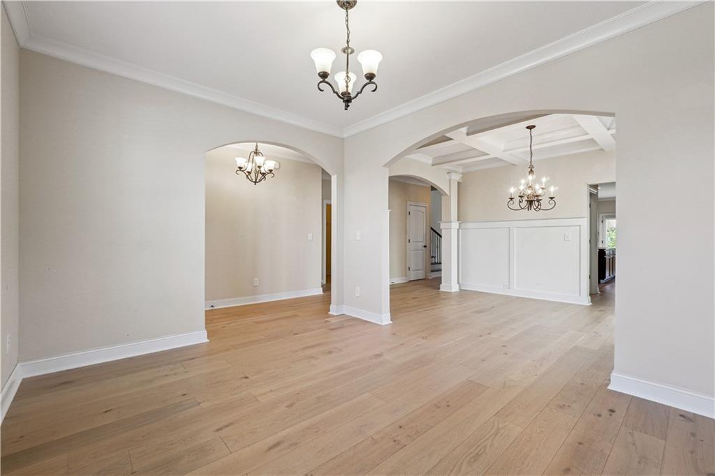 5145 Rialto Way Cumming, GA 30040 - Photo 3 of 25 a view of a hallway with windows and chandelier