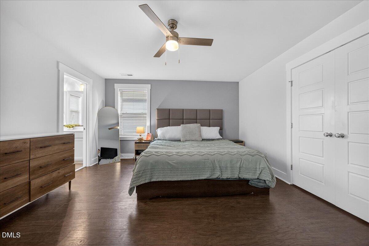 251 Daniel Ridge Road Wendell, NC 27591 - Photo 22 of 73 a bedroom with a bed and a dresser