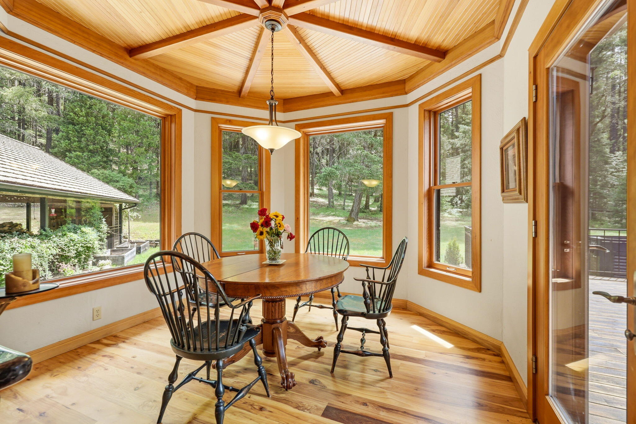 985 Elliott Creek Road Wilderville, OR 97543 - Photo 18 of 98 a dining room with furniture and windows