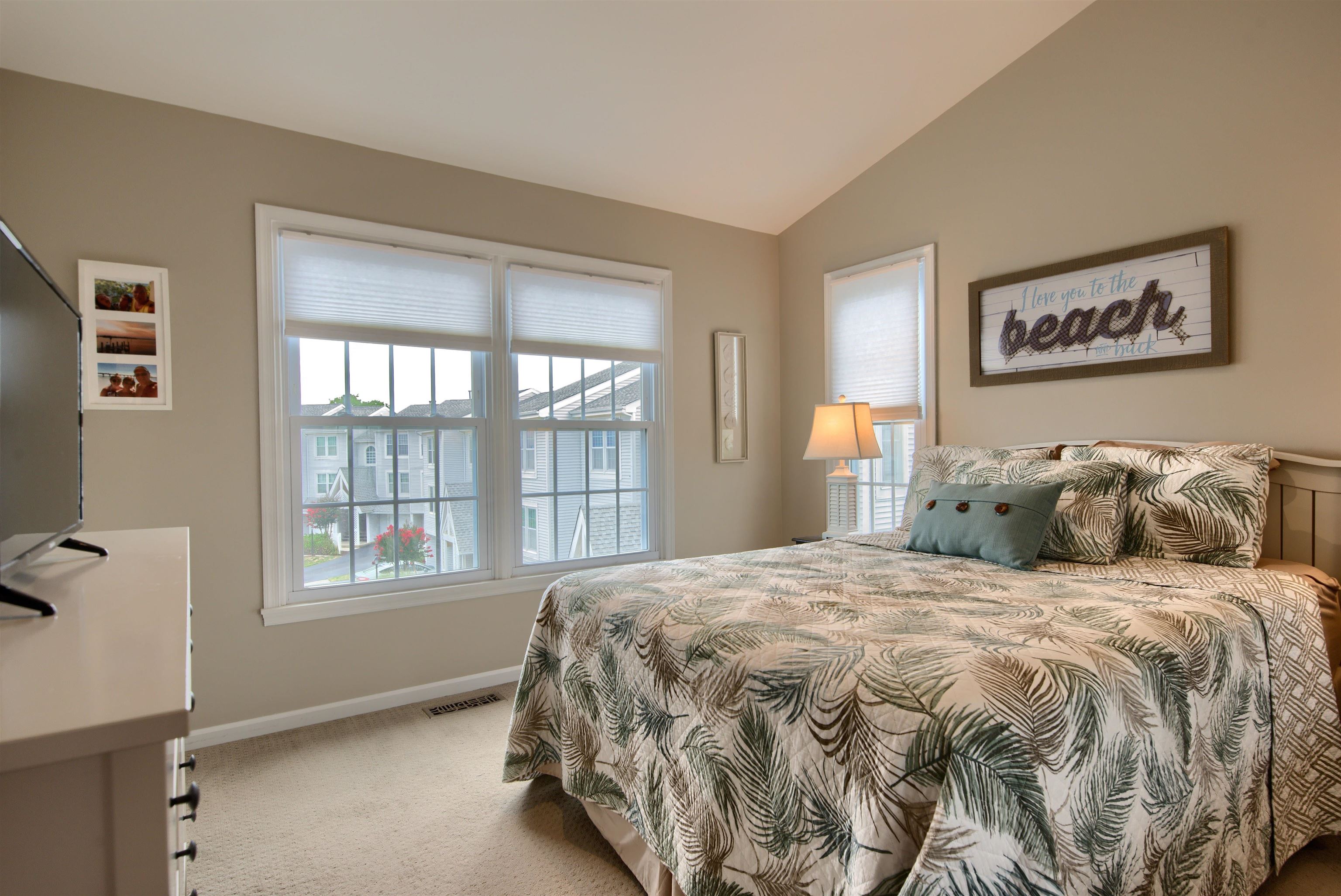 167 South 40th, Unit 2 Brigantine, NJ 08203 - Photo 15 of 28 a bedroom with a bed and a window