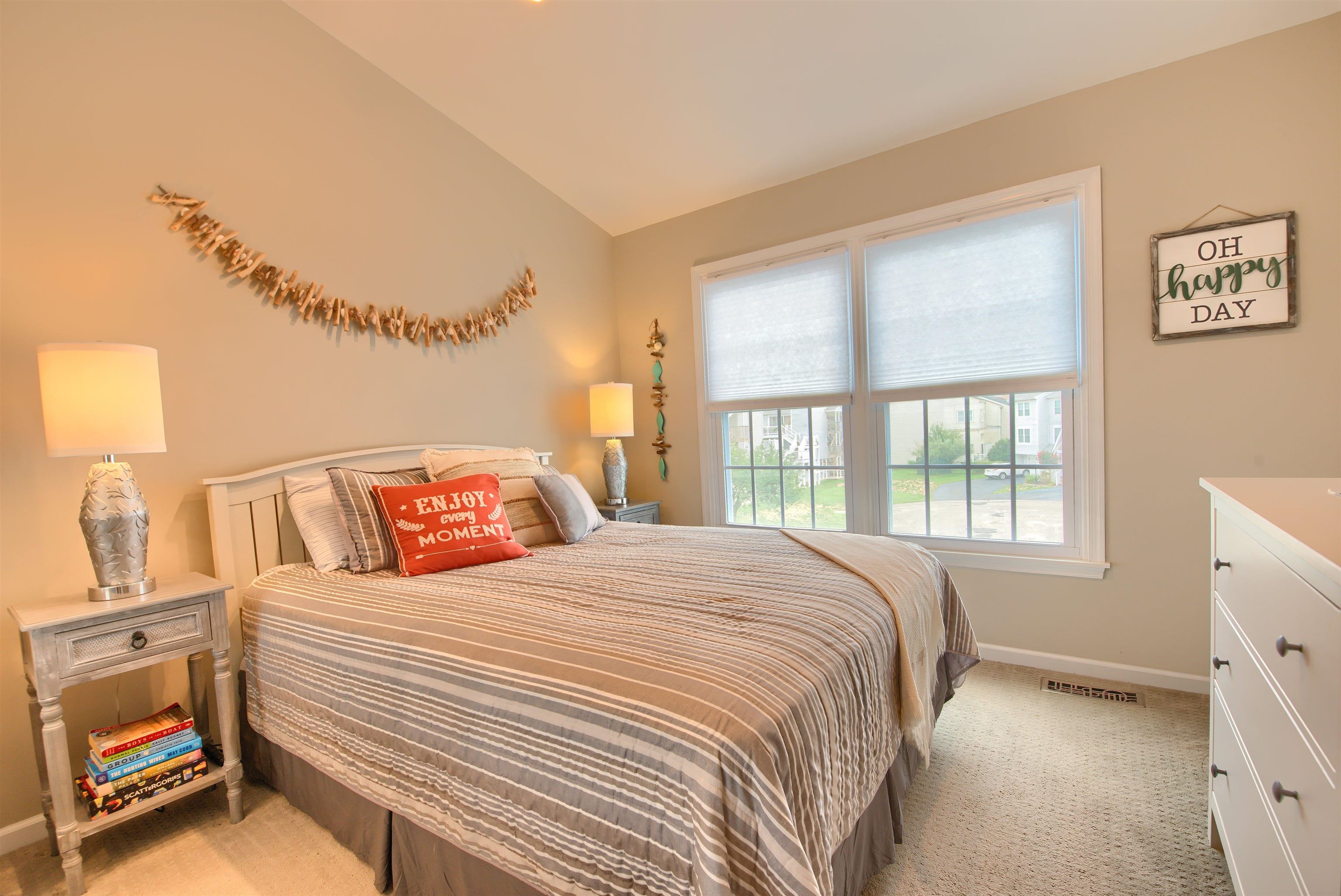 167 South 40th, Unit 2 Brigantine, NJ 08203 - Photo 18 of 28 a bedroom with a bed and a window