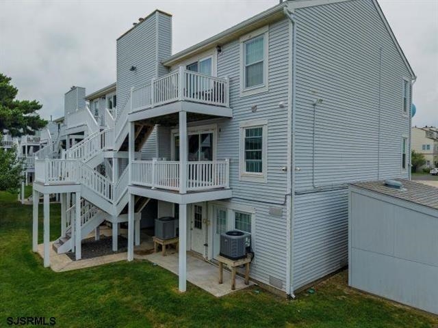 167 South 40th, Unit 2 Brigantine, NJ 08203 - Photo 28 of 28 a view of a house with a yard and sitting area