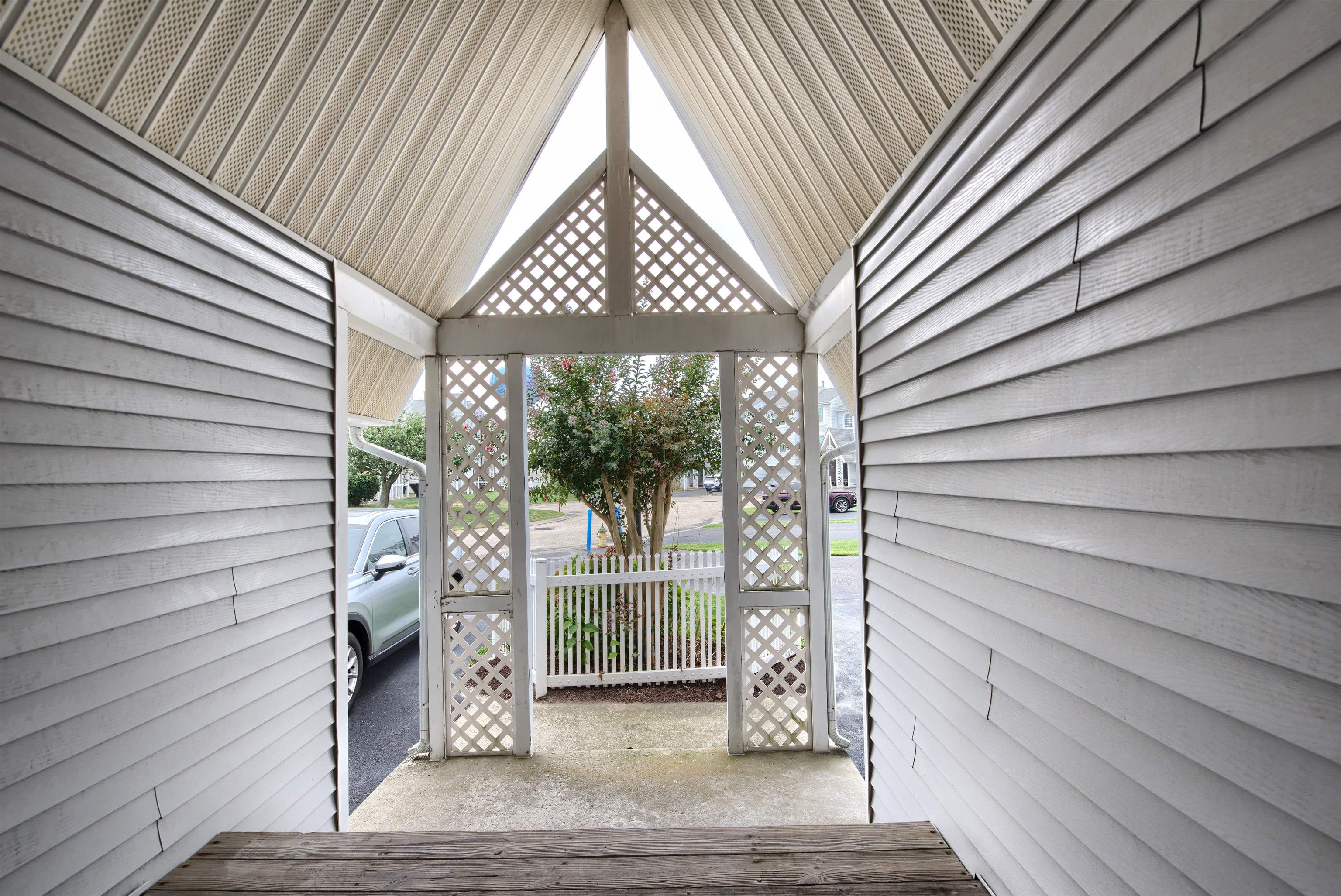 167 South 40th, Unit 2 Brigantine, NJ 08203 - Photo 5 of 28 a view of a house with a porch