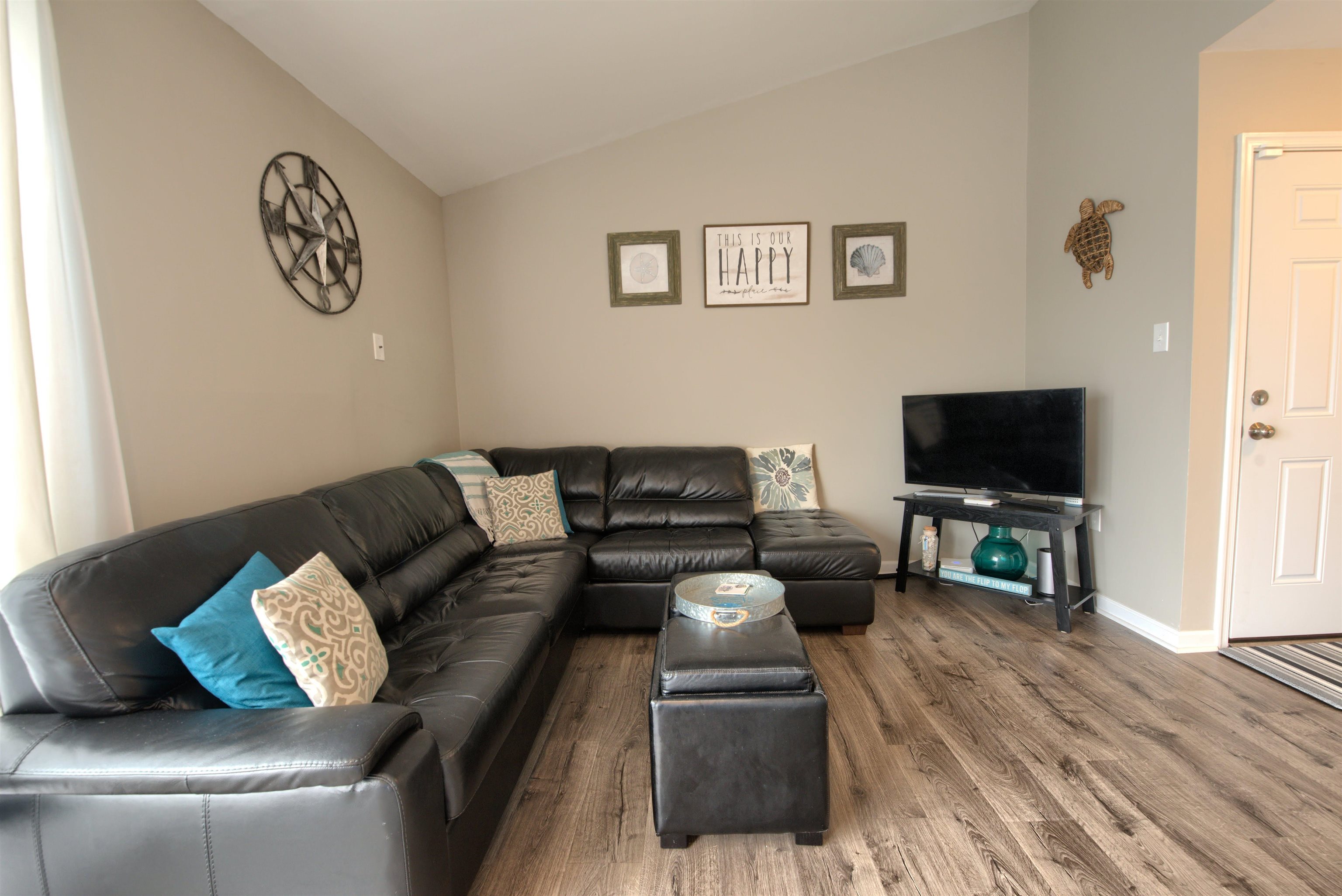 167 South 40th, Unit 2 Brigantine, NJ 08203 - Photo 7 of 28 a living room with furniture and a flat screen tv