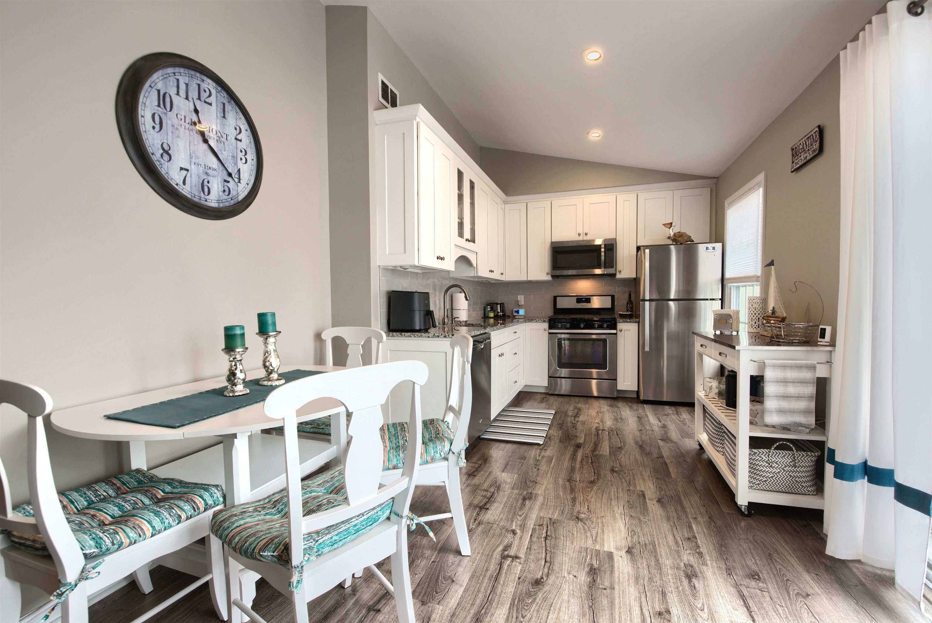 167 South 40th, Unit 2 Brigantine, NJ 08203 - Photo 10 of 28 a view of kitchen with sink and wooden floor