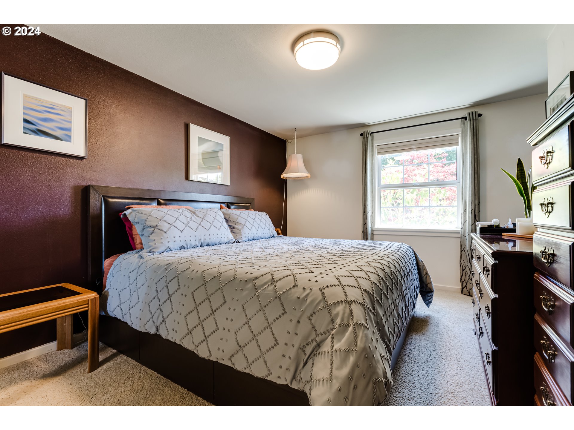 3715 Harlow Road Eugene, OR 97401 - Photo 19 of 39 a bedroom with a bed and a window