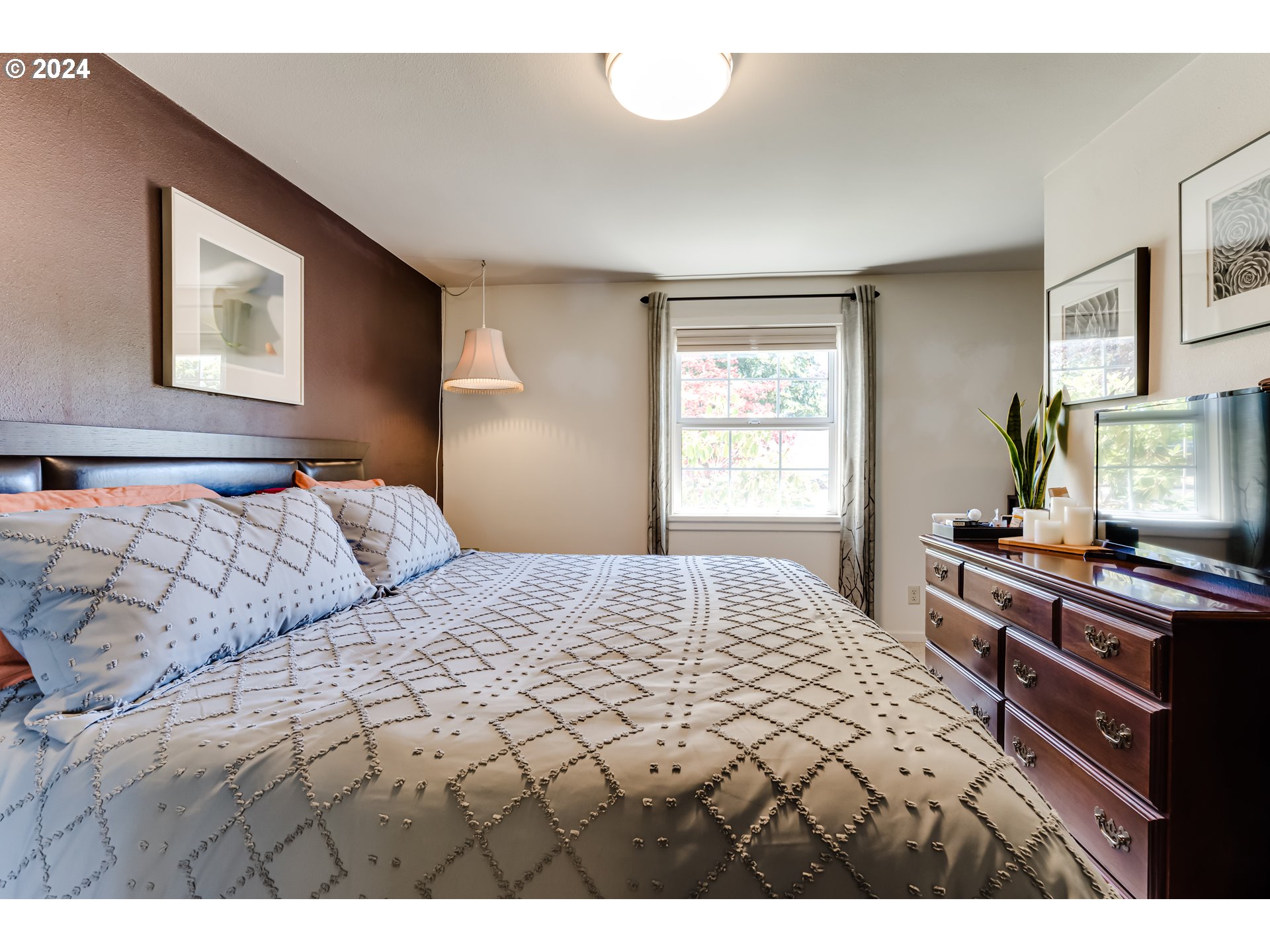 3715 Harlow Road Eugene, OR 97401 - Photo 20 of 39 a bedroom with a bed and a window