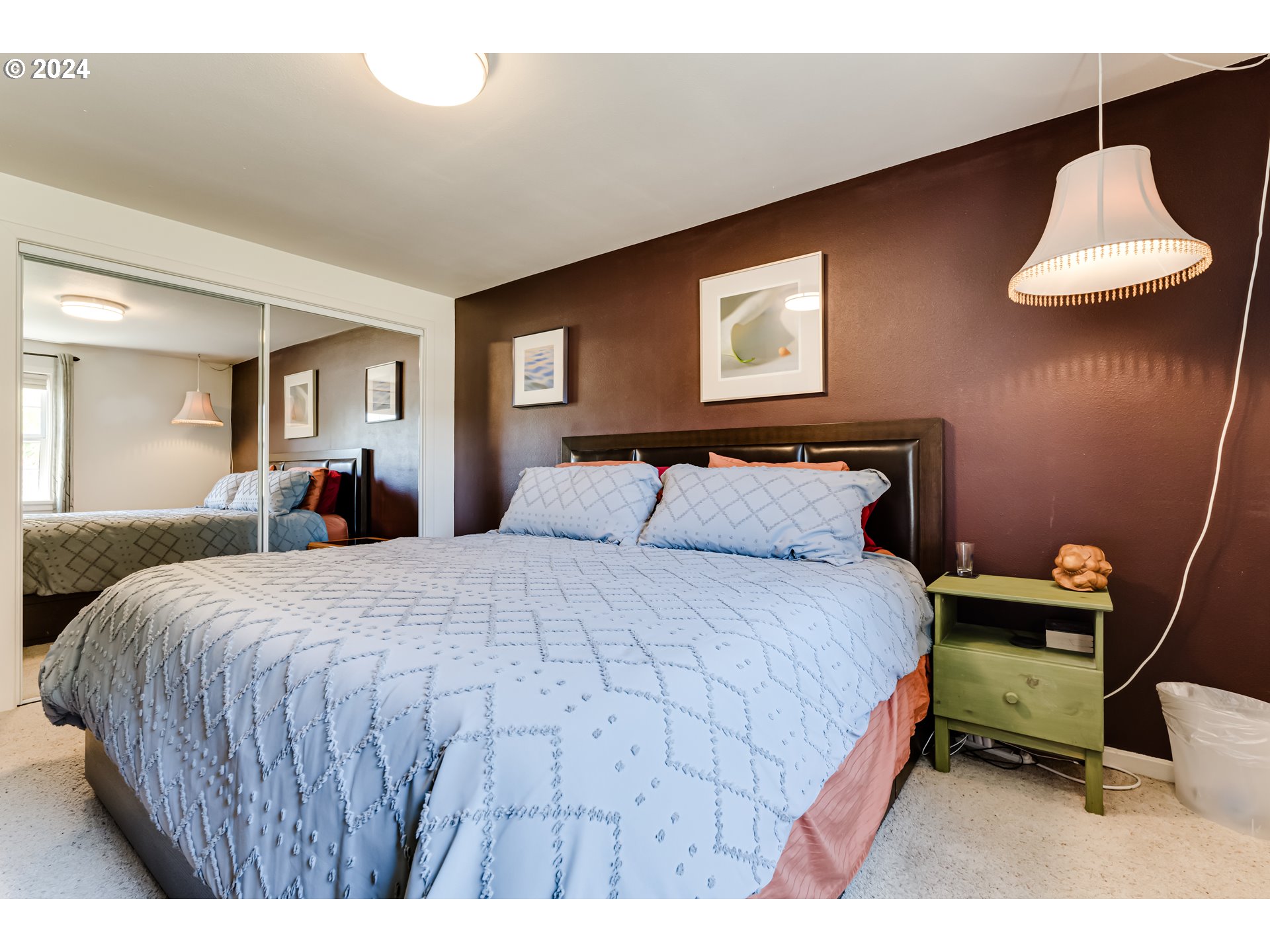 3715 Harlow Road Eugene, OR 97401 - Photo 22 of 39 a bedroom with a bed and a lamp