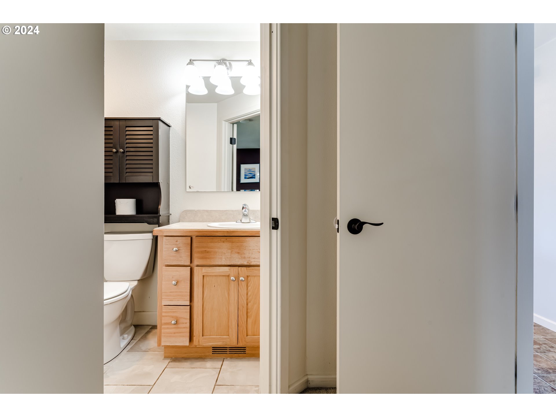 3715 Harlow Road Eugene, OR 97401 - Photo 24 of 39 a bathroom with a sink a toilet and shower