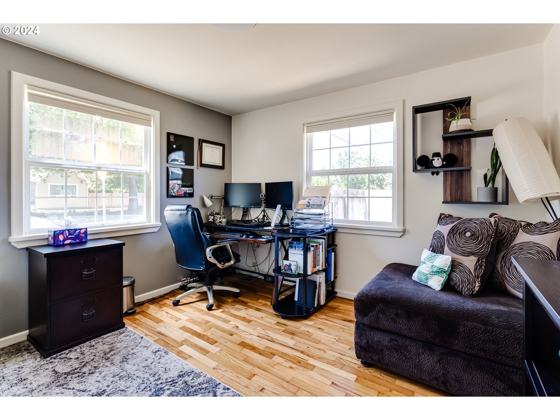 3715 Harlow Road Eugene, OR 97401 - Photo 27 of 39 a living room with furniture window and a wooden floor