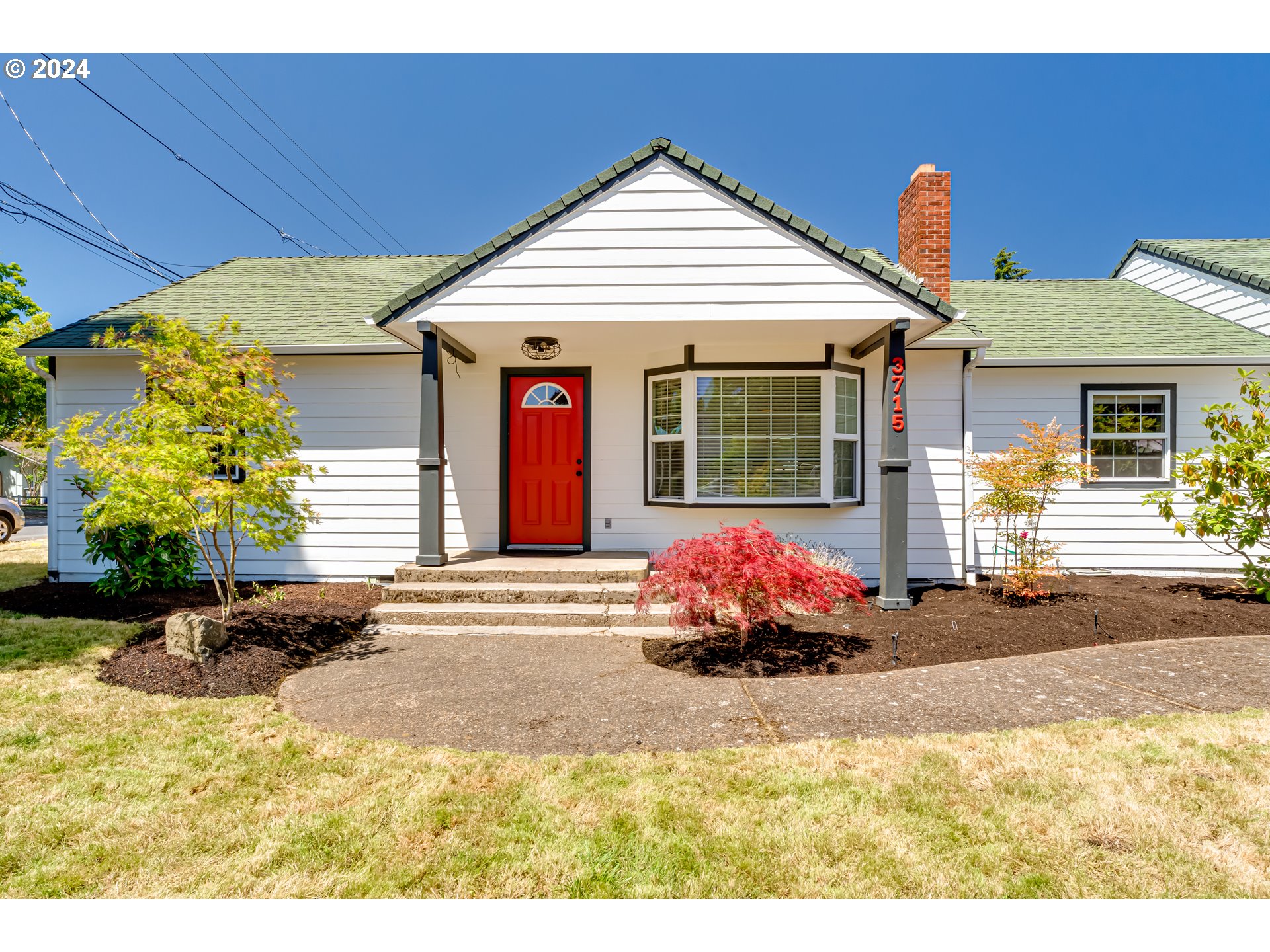 3715 Harlow Road Eugene, OR 97401 - Photo 3 of 39 a front view of a house with a yard