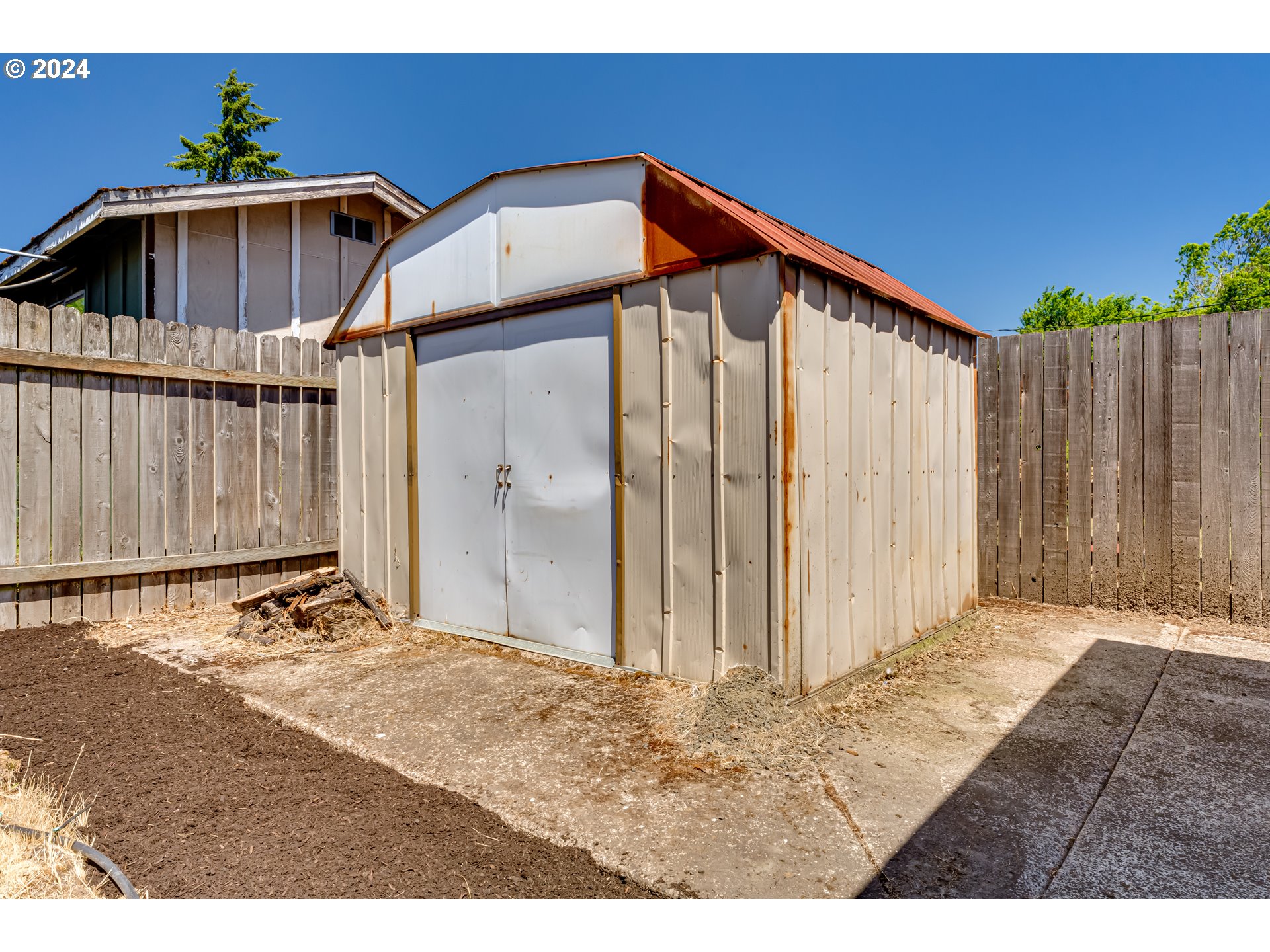 3715 Harlow Road Eugene, OR 97401 - Photo 39 of 39 a view of a house with wooden floor and a yard