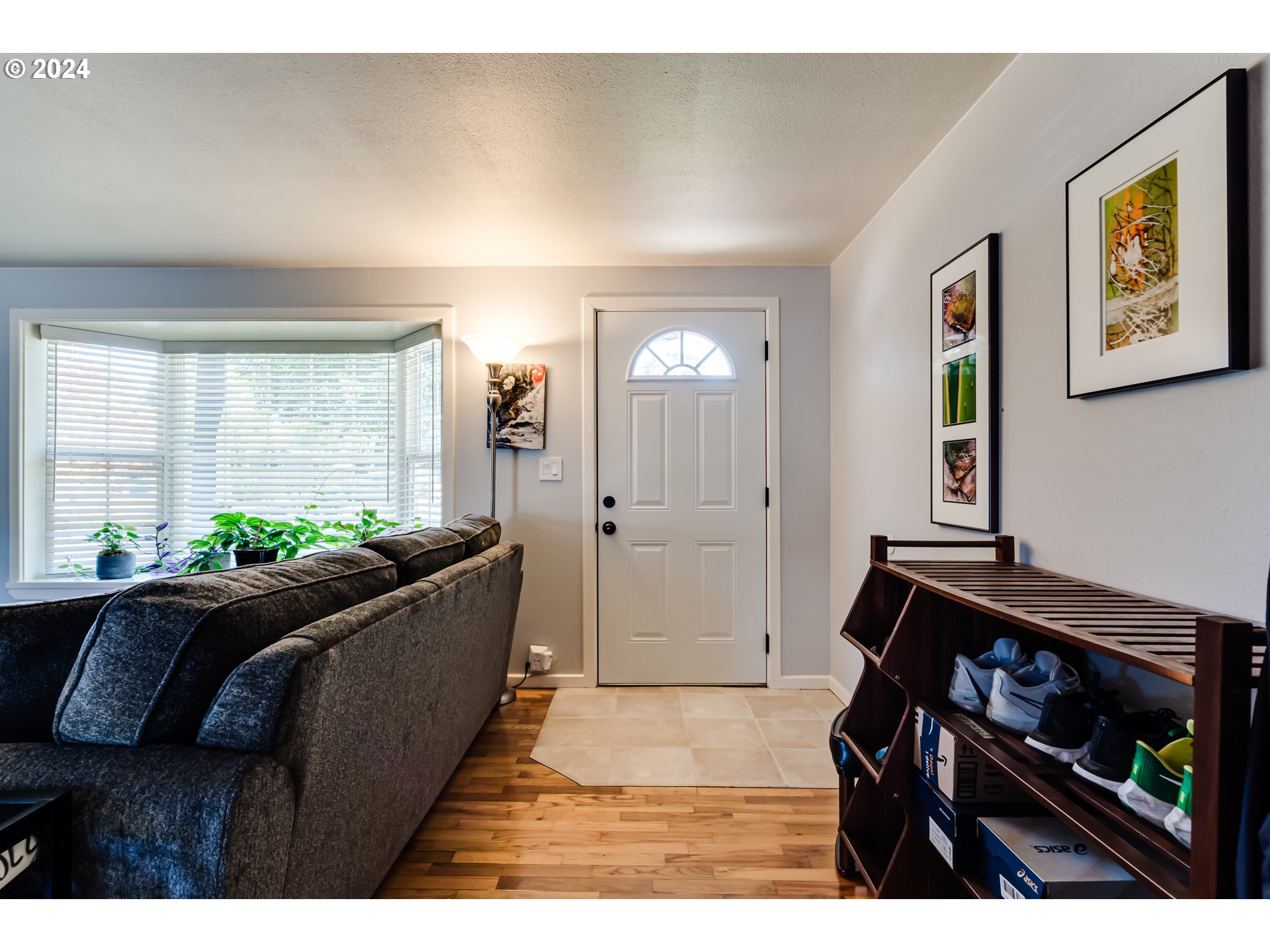 3715 Harlow Road Eugene, OR 97401 - Photo 9 of 39 a living room with furniture and a gate