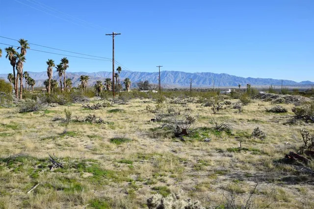 a view of a backyard of a house