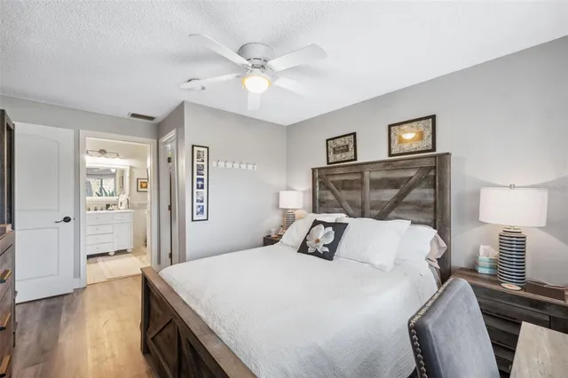 an aerial view of a house with a big yard