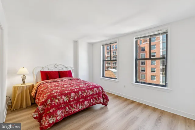 a view of walk in closet with racks on the wall