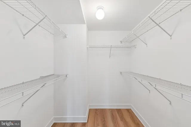 a view of a building with sitting area