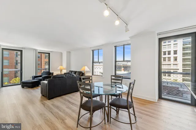 a view of a livingroom with furniture and wooden floor