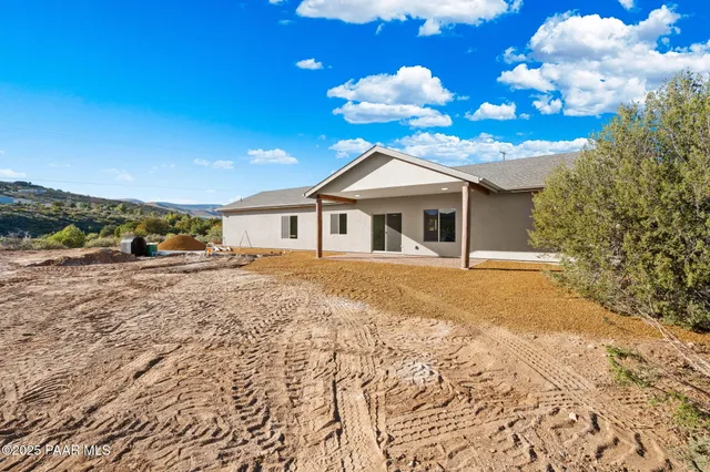a view of a house with a patio
