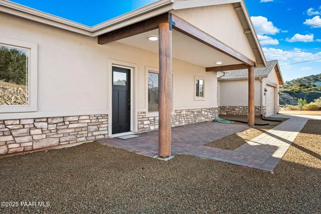 a view of a house with a porch