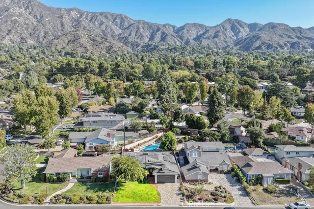 an aerial view of residential house with outdoor space