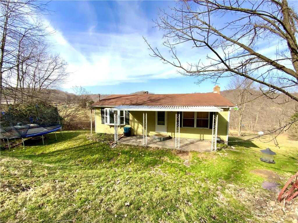 229 Upper Service Road Hookstown, PA 15050 - Photo 1 of 21 a view of a house with pool and sitting area