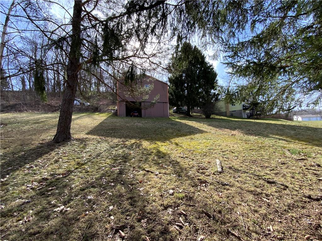 229 Upper Service Road Hookstown, PA 15050 - Photo 21 of 21 a view of a yard with large trees