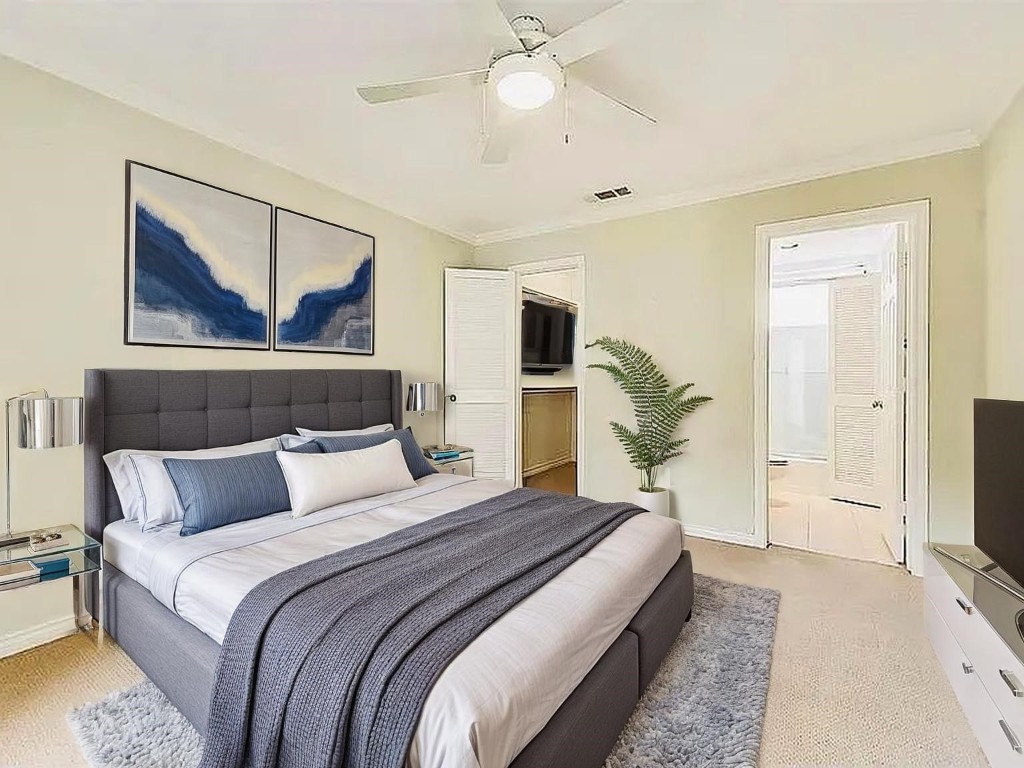 4518 Glenwick Lane Dallas, TX 75205 - Photo 11 of 14 a bedroom with bed and ceiling fan