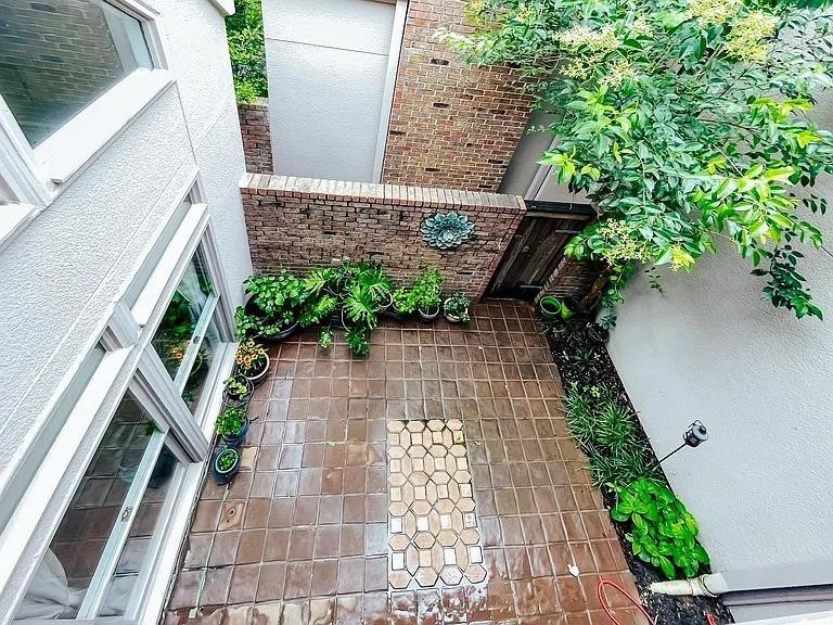 4518 Glenwick Lane Dallas, TX 75205 - Photo 14 of 14 a view of a pathway with plants