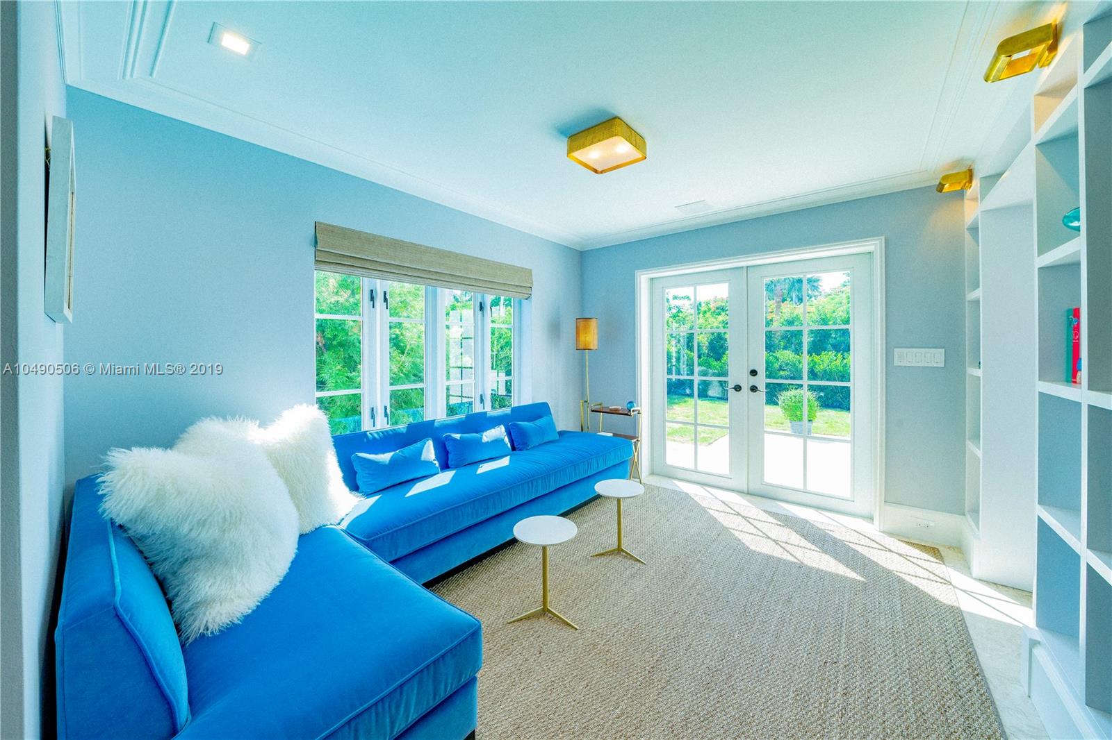 6332 Alton Road Miami Beach, FL 33141 - Photo 20 of 91 a living room with furniture and a window