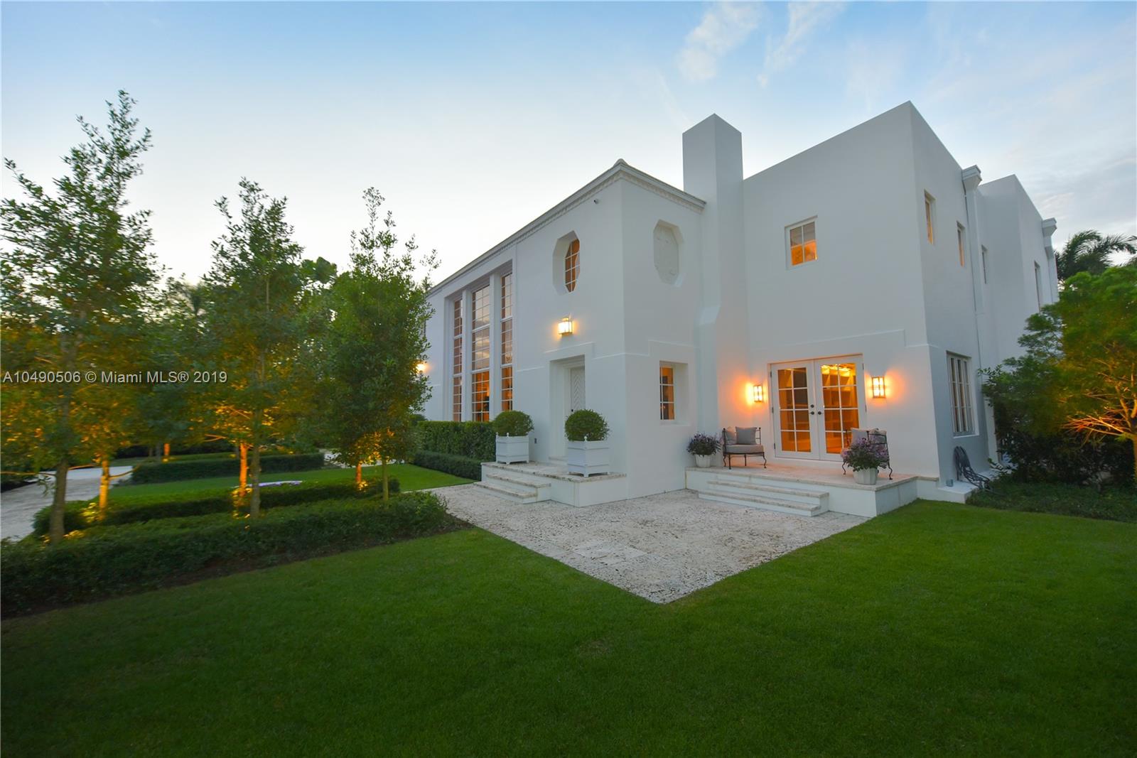 6332 Alton Road Miami Beach, FL 33141 - Photo 3 of 91 a view of a house with a yard and tree s