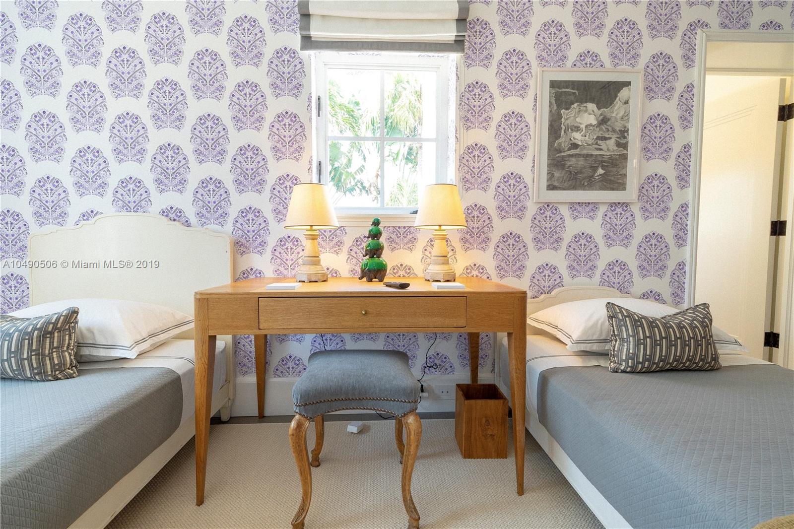 6332 Alton Road Miami Beach, FL 33141 - Photo 41 of 91 a bedroom with a bed and a window