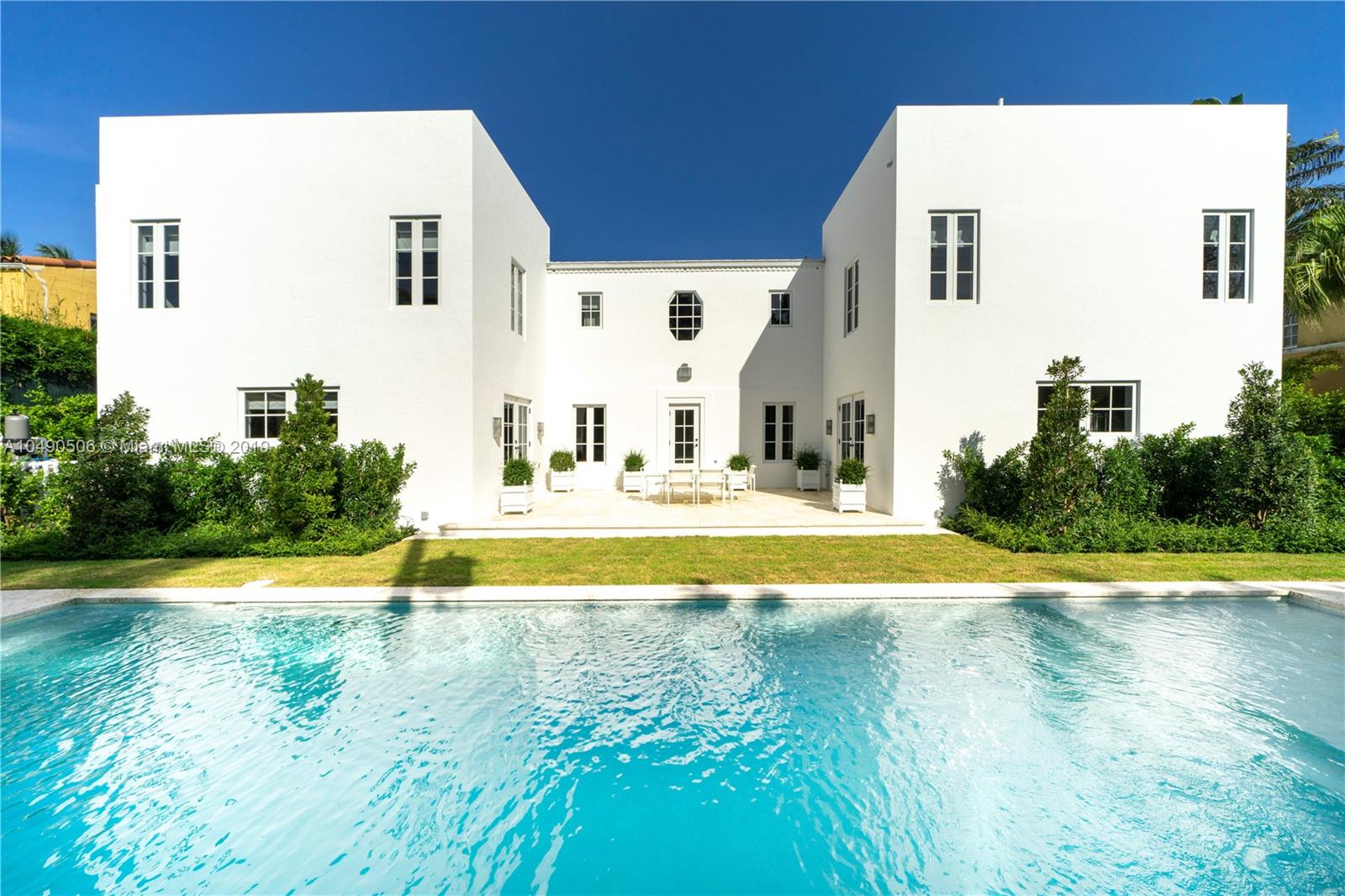 6332 Alton Road Miami Beach, FL 33141 - Photo 49 of 91 a view of swimming pool with outdoor space and seating area