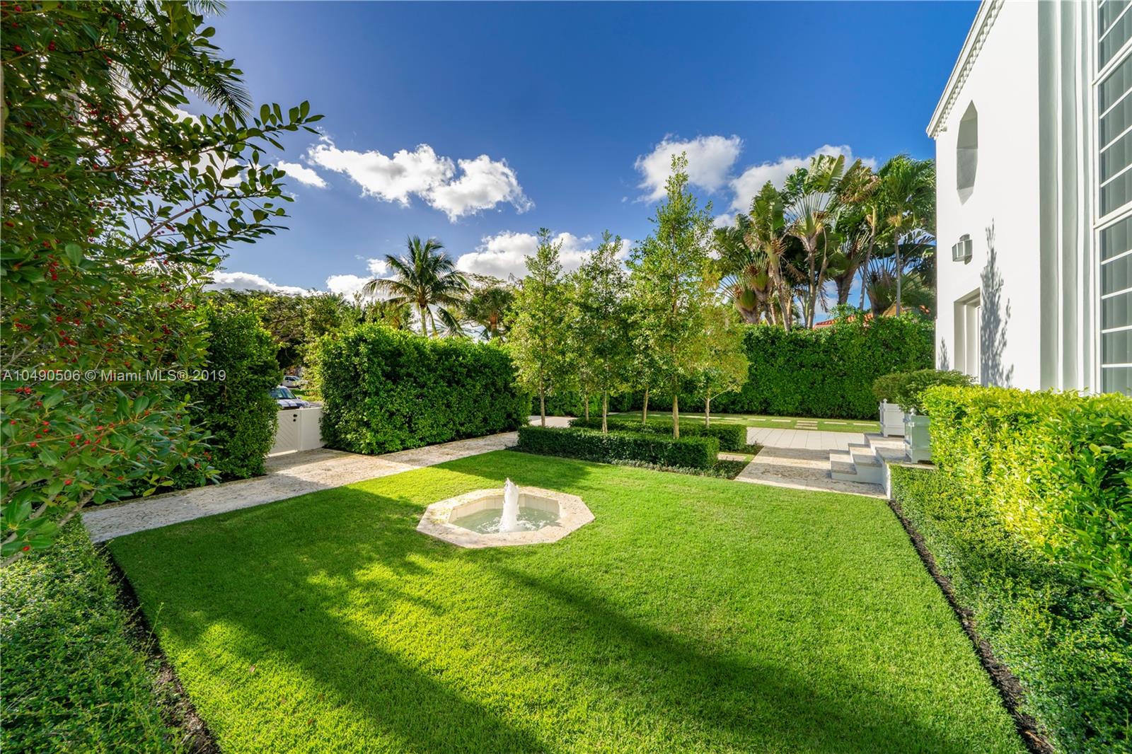 6332 Alton Road Miami Beach, FL 33141 - Photo 74 of 91 a view of a backyard with swimming pool