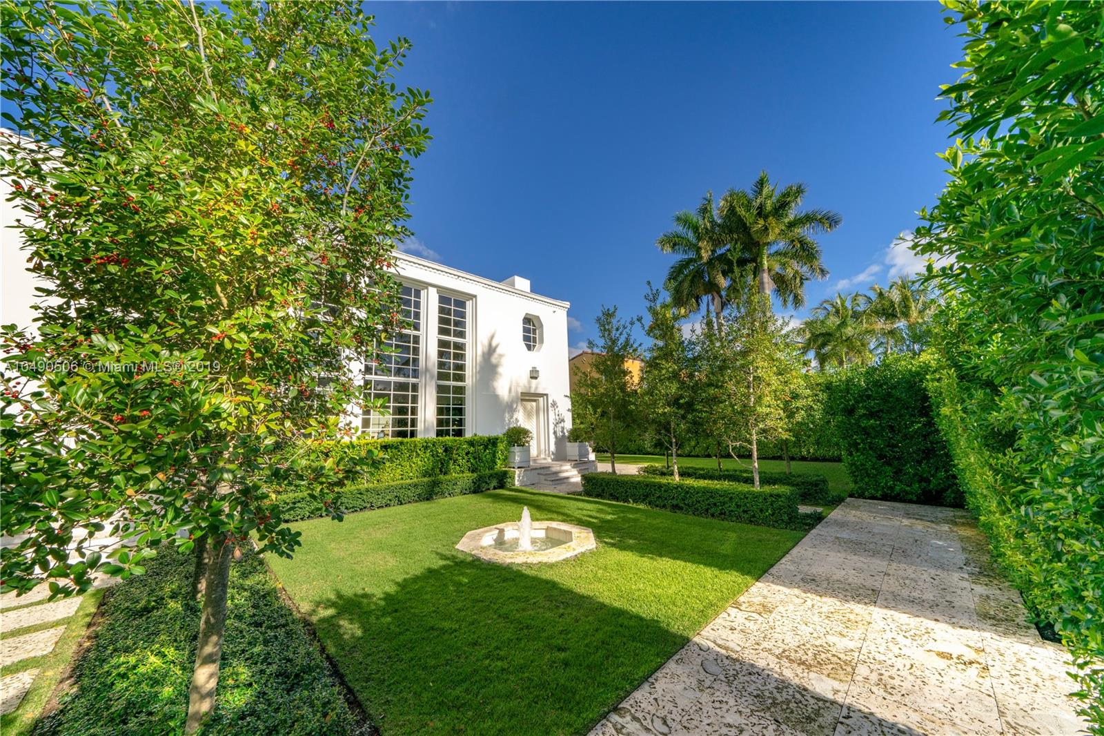 6332 Alton Road Miami Beach, FL 33141 - Photo 83 of 91 a view of a house with a yard and potted plants