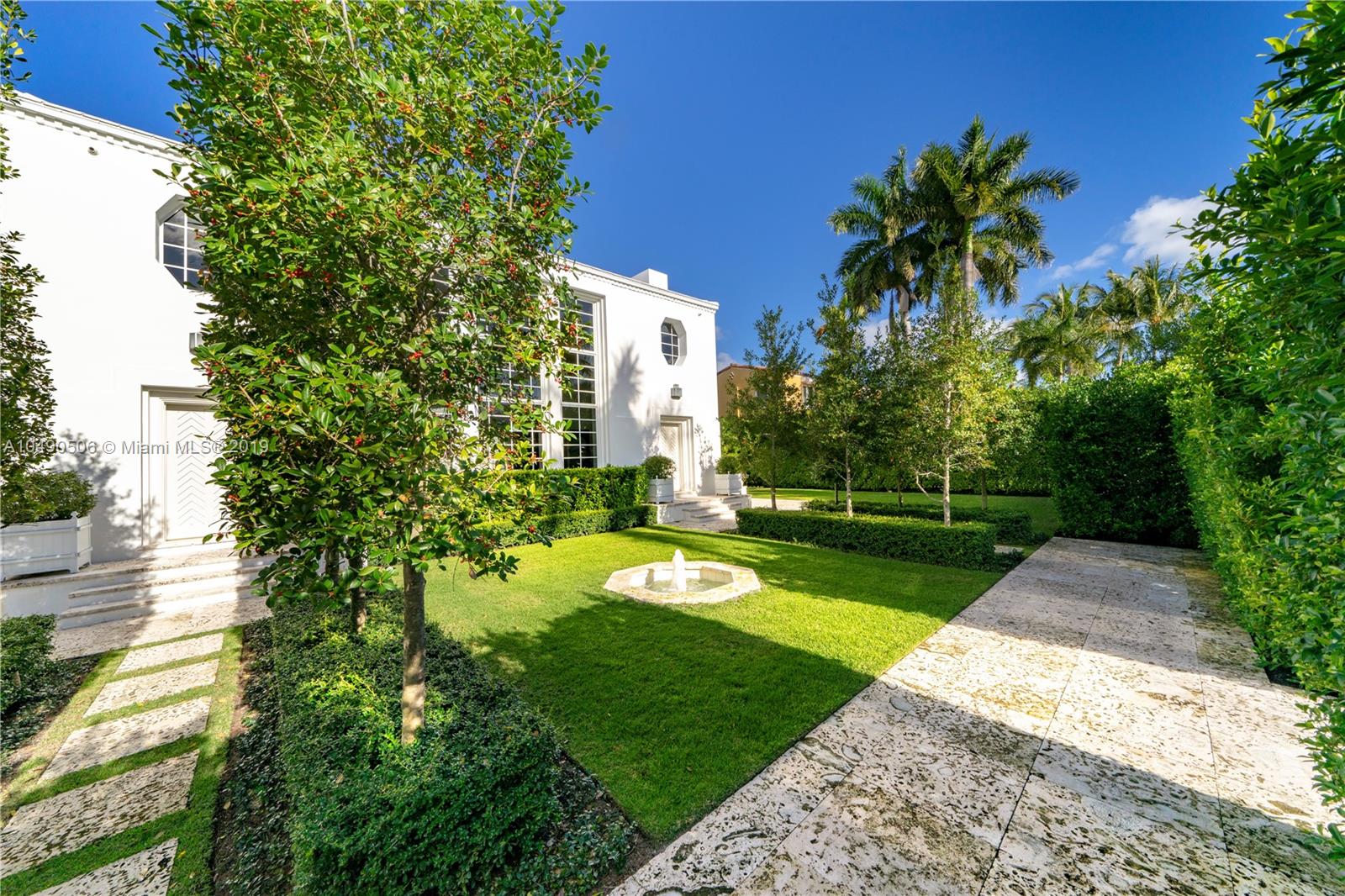6332 Alton Road Miami Beach, FL 33141 - Photo 84 of 91 a view of a house with a yard and potted plants