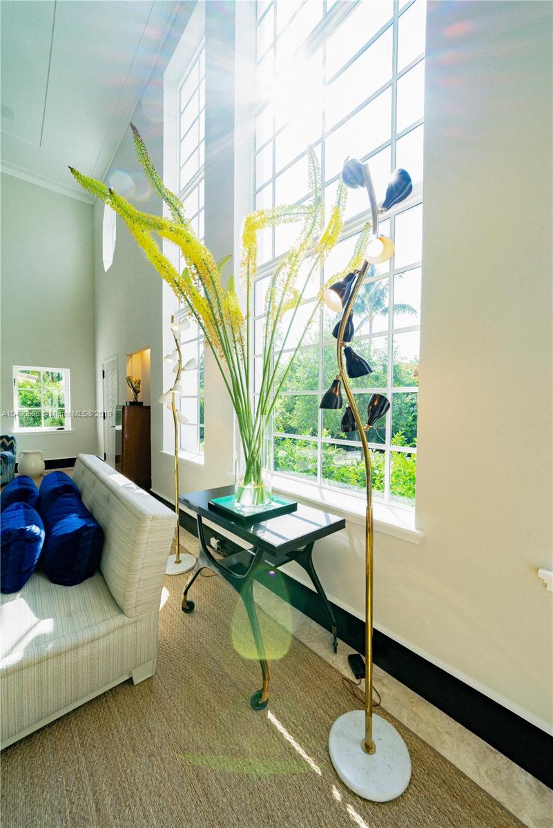 6332 Alton Road Miami Beach, FL 33141 - Photo 9 of 91 a living room with furniture and a table