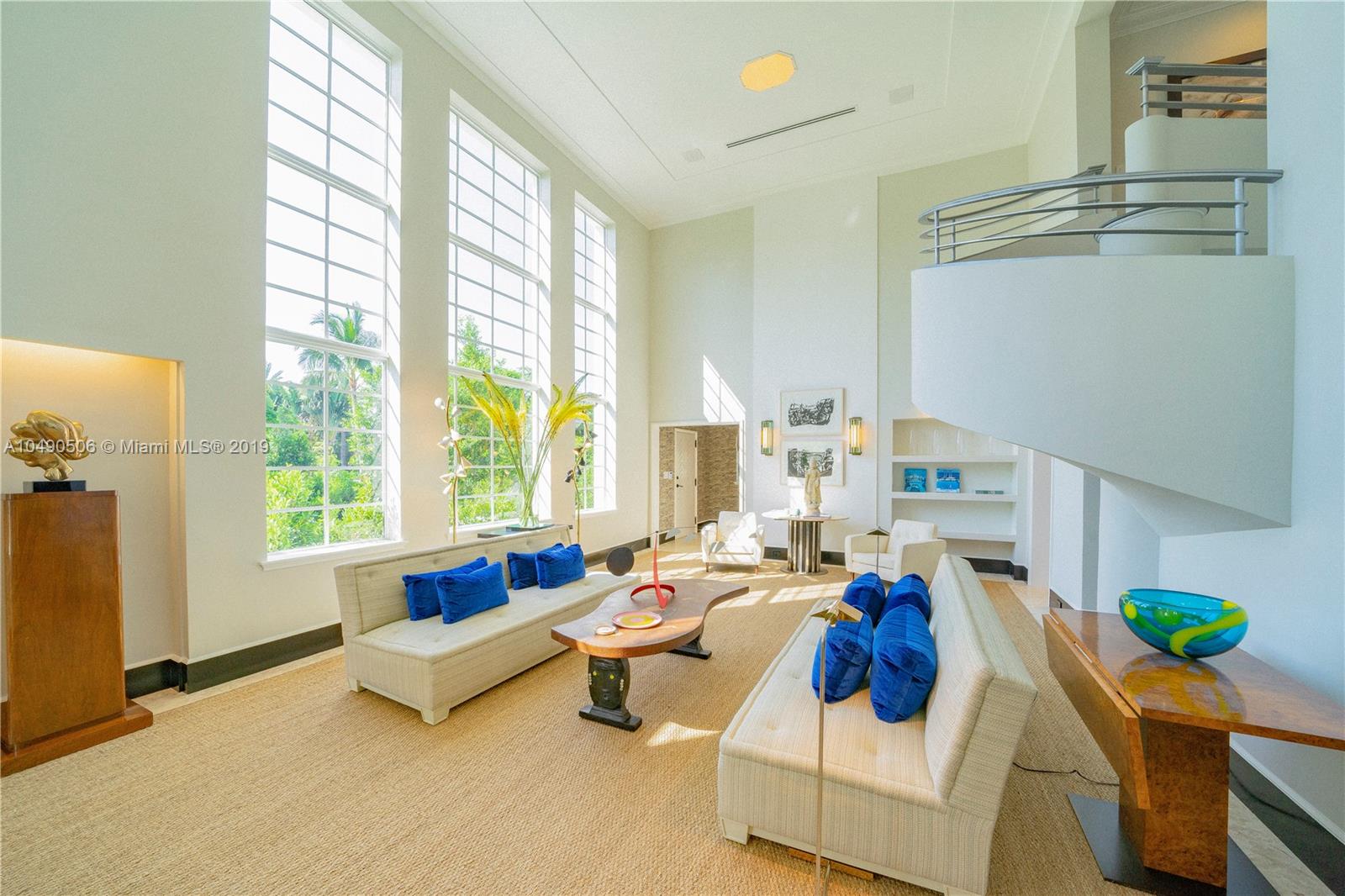6332 Alton Road Miami Beach, FL 33141 - Photo 10 of 91 a living room with furniture and a window