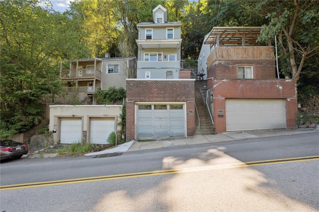 677 Greentree Road Pittsburgh, PA 15220 - Photo 1 of 29 front view of a house with a street