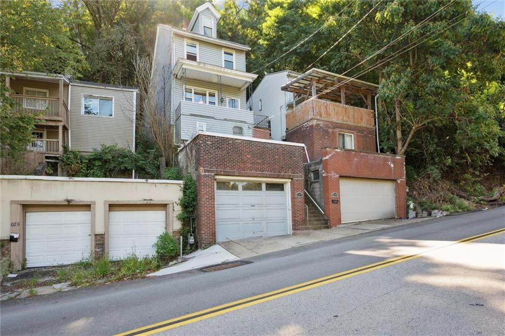 677 Greentree Road Pittsburgh, PA 15220 - Photo 2 of 29 front view of a house with a street