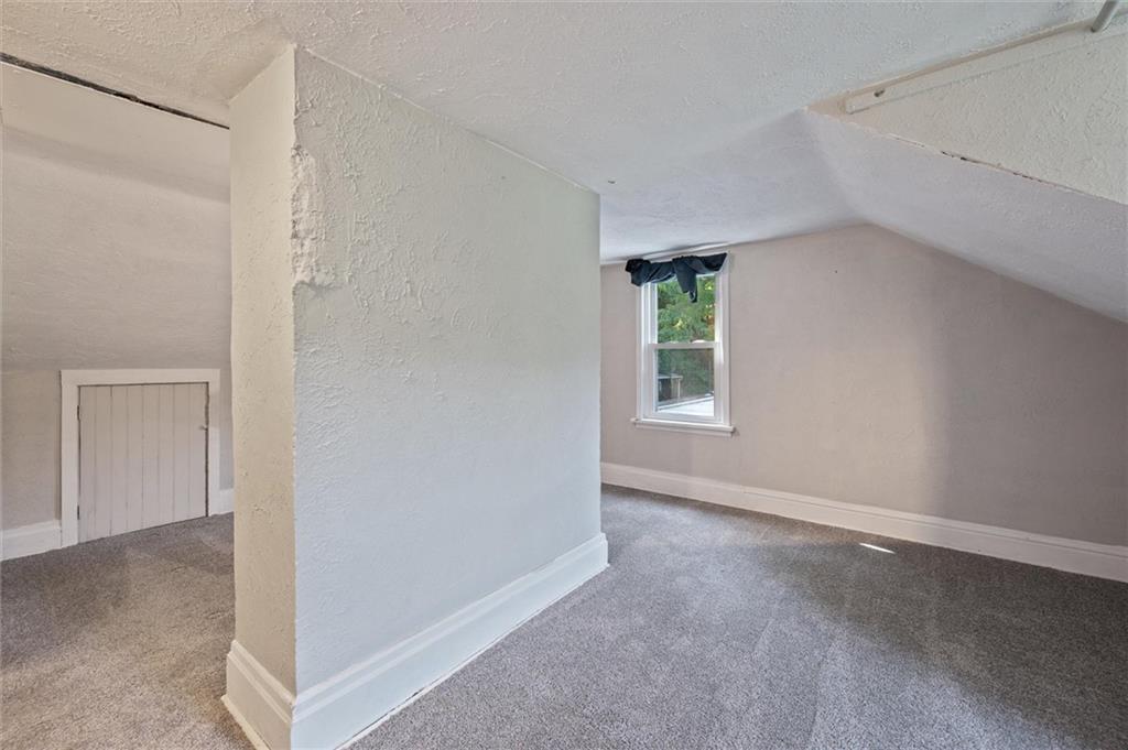 677 Greentree Road Pittsburgh, PA 15220 - Photo 24 of 29 a view of an empty room with windows