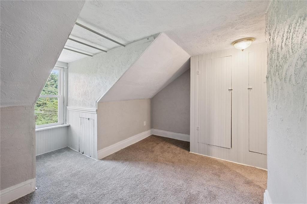 677 Greentree Road Pittsburgh, PA 15220 - Photo 26 of 29 a view of an empty room with windows and entryway