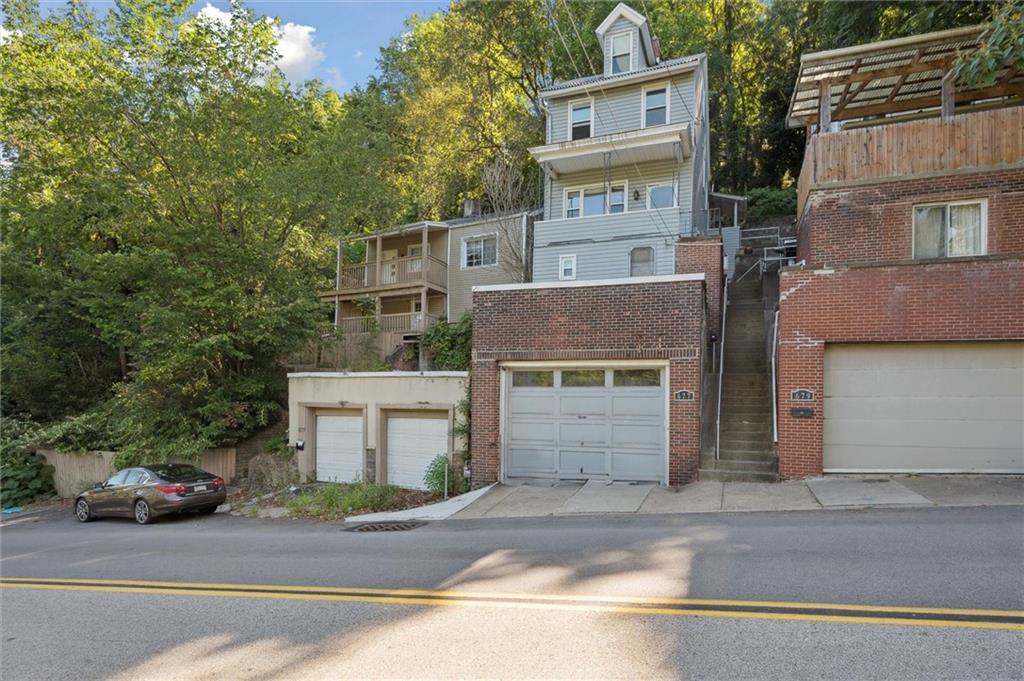 677 Greentree Road Pittsburgh, PA 15220 - Photo 3 of 29 front view of a house with a street