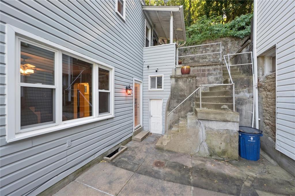 677 Greentree Road Pittsburgh, PA 15220 - Photo 5 of 29 a view of wooden house with a and entryway
