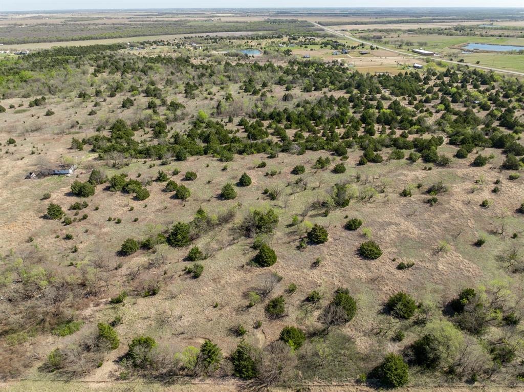 843 Lake Ridge Road Italy, TX 76651 - Photo 10 of 22 a view of a field with an outdoor space