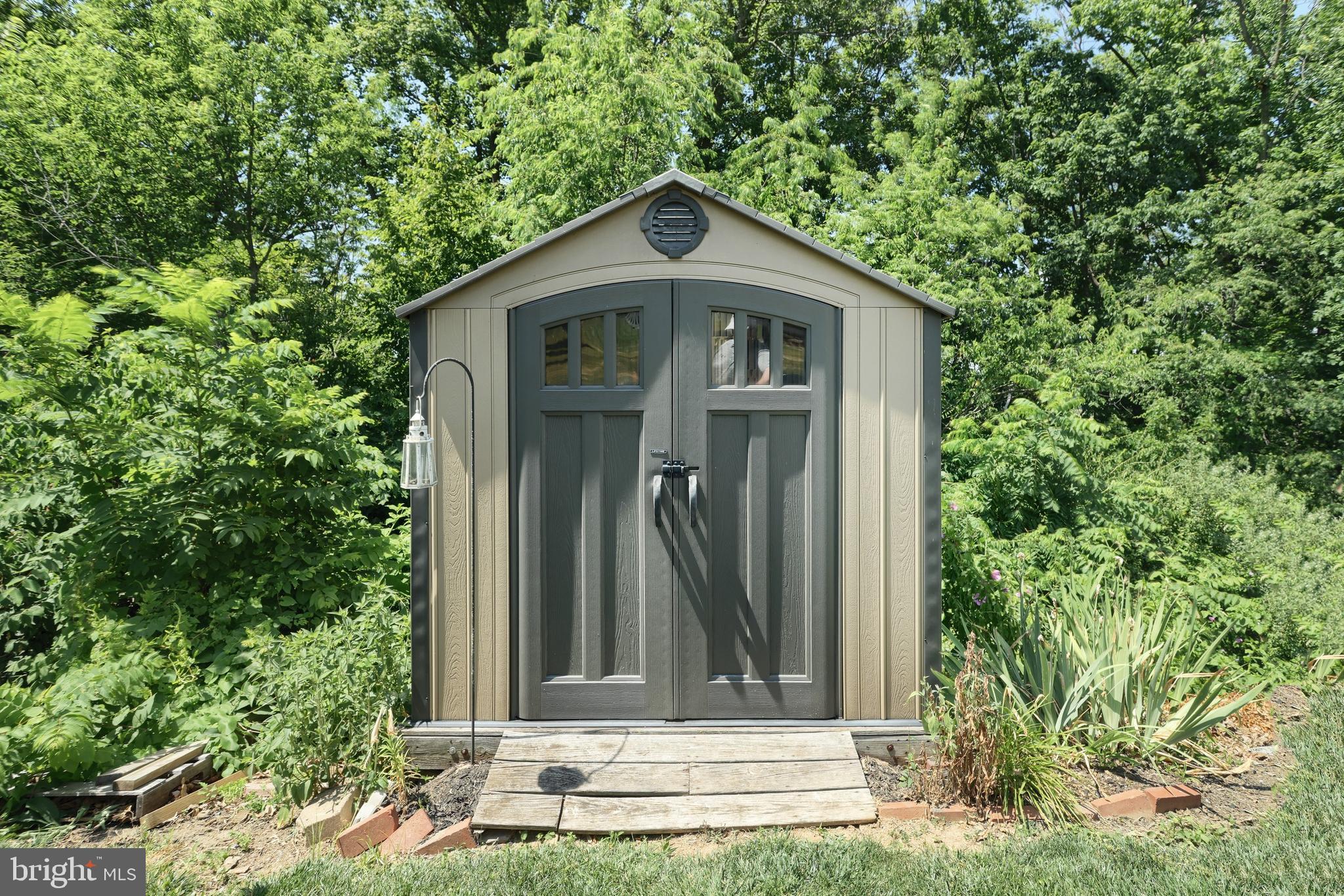 3417 Heather Drive York, PA 17408 - Photo 34 of 52 Small shed past the fence