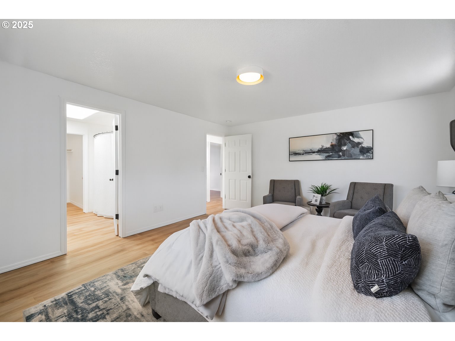 2952 Northwest Ogden Street Camas, WA 98607 - Photo 17 of 31 a bedroom with a bed and a painting